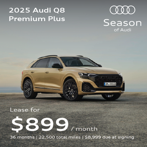 Angled profile of 2025 Audi Q8 parked